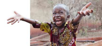 a child enjoying the rain